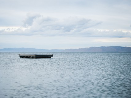 Raft floating on water.