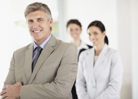 Portrait of cheerful businessman. Photo : Momentimages