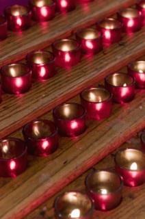 Rows of candles in cathedral. Photo : Antonio M. Rosario