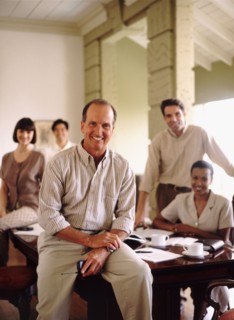 Colleagues in conference room. Photo : Fisher Litwin