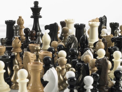 King with group of chess pieces. Photo : David Arky