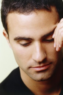 Worried man. Photo : Fisher Litwin
