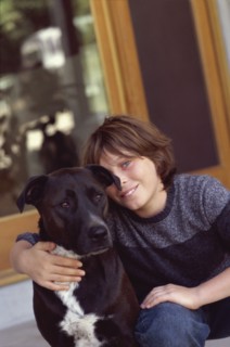 Young boy and his dog. Photo : Fisher Litwin