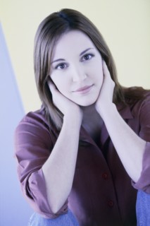 Pensive woman. Photo : Fisher Litwin