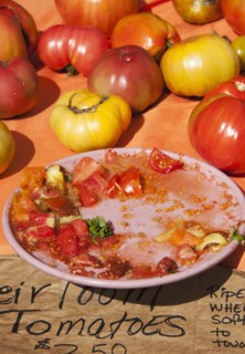 Fresh tomatoes on market stall.