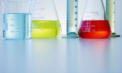 Beakers and flasks with colorful liquids.