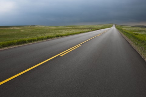 Highway crossing Badlands National Park.