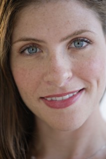 Portrait of smiling young woman.