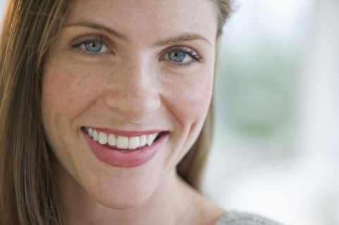 Portrait of smiling young woman.
