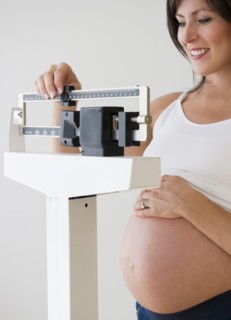 Young pregnant woman. Photo : Jamie Grill
