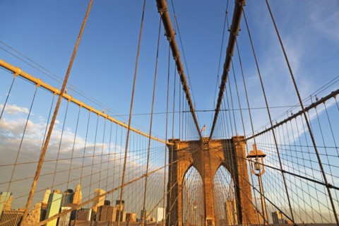 USA, New York State, New York City, Span of Brooklyn Bridge, Manhattan skyline in background. Photo