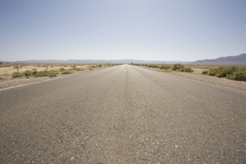 Road in desert. Photo : Chris Hackett