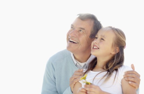 Happy grandfather and granddaughter (10-11). Photo : Momentimages