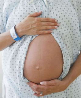 Young pregnant woman. Photo : Jamie Grill