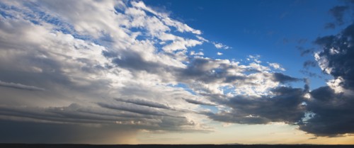 Cloudscape over field.