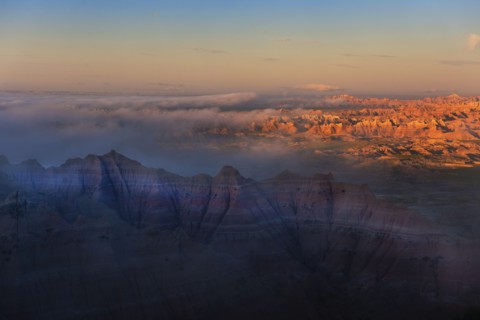USA, South Dakota, Mountains in Badlands National Park at sunset.