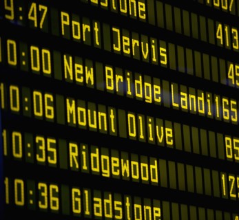 Close-up of arrival departure board. Photo : fotog