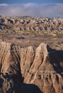 USA, South Dakota, Mountains in morning fog in Badlands National Park.