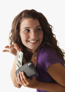 Young woman removing banknote from wallet. Photo : Mike Kemp