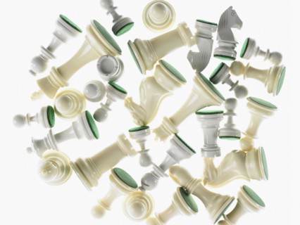 Various white chess pieces. Photo : David Arky