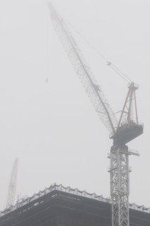 Construction crane in fog. Photo : Antonio M. Rosario