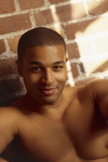 Shirtless handsome man. Photo : Fisher Litwin