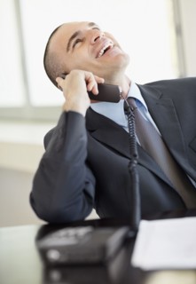 Businessman on the phone. Photo : Momentimages
