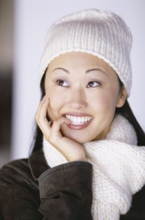 Pretty woman wearing winter hat and scarf. Photo : Fisher Litwin