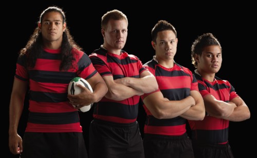 Studio portrait of male rugby team. Photo : Mike Kemp