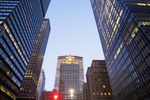 USA, New York State, New York City, Office buildings illuminated at dusk. Photo : fotog