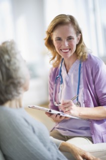 USA, New Jersey, Jersey City, Female nurse with patient.