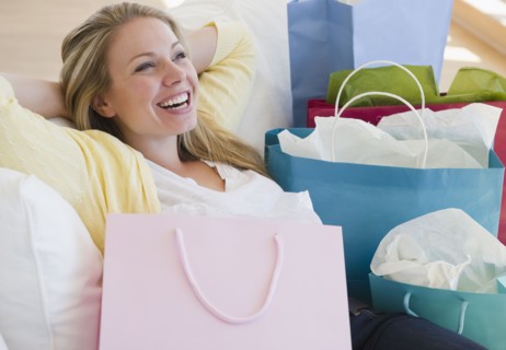 USA, New Jersey, Jersey City, Young attractive woman resting after shopping. Photo : Jamie Grill