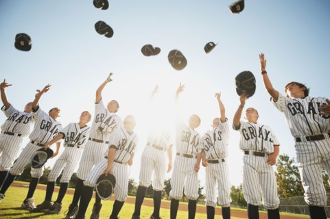 USA, California, Ladera Ranch, little league players (aged 10-11) celebrating.