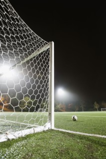 USA, California, Ladera Ranch, Football in front of goal.