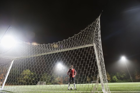 USA, California, Ladera Ranch, Football player preparing for penalty kick.