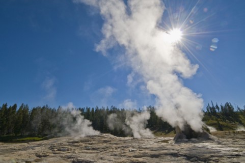 USA, Wyoming, Sun over steaming thermal pool. Photo : Gary J Weathers