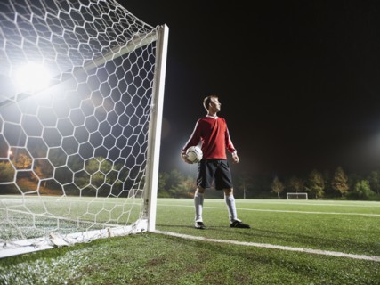 USA, California, Ladera Ranch, Football player preparing for penalty kick.