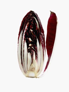 Studio shot of cross section of red cabbage. Photo : David Arky