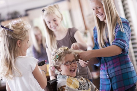 USA, Utah, family portrait of sisters (6-7, 8-9, 12-13, 14-15, 16-17) preparing hairs and having