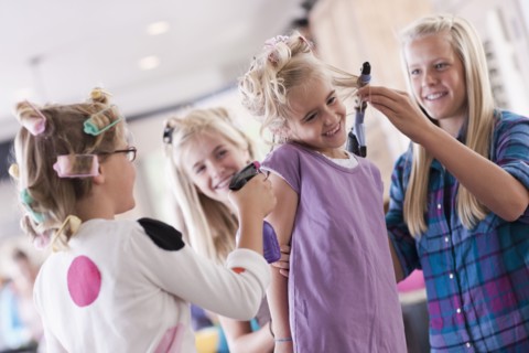 USA, Utah, family portrait of sisters (6-7, 8-9, 12-13, 14-15, 16-17) preparing hairs and having