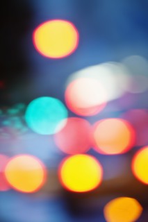 USA, New York City, City lights out of focus.