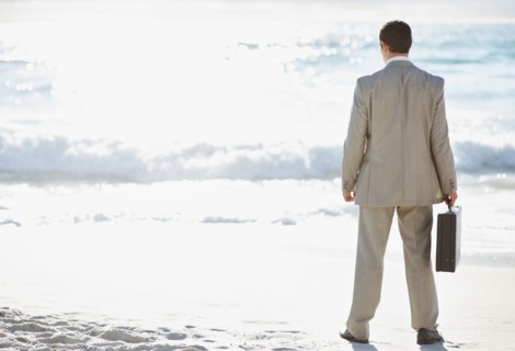 South Africa, Businessman standing, rear view. Photo : momentimages
