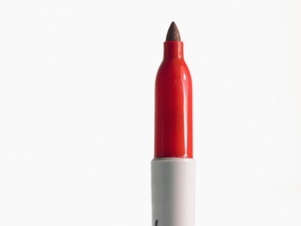 Studio shot of red felt-tip pen. Photo : David Arky