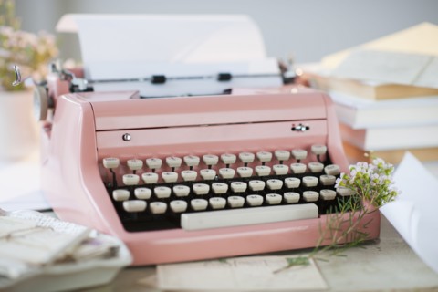 Letters by antique typewriter.