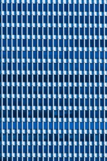 USA, New York, New York City, Windows of office block.