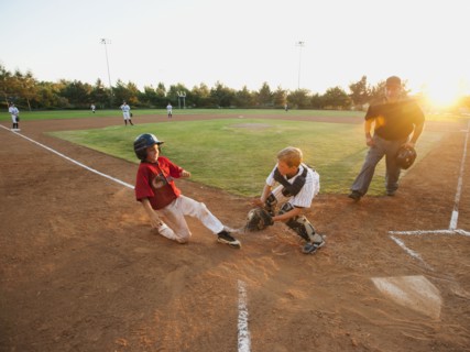 USA, California, Ladera Ranch, boys (10-11) playing baseball.