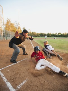 USA, California, Ladera Ranch, boys (10-11) playing baseball.