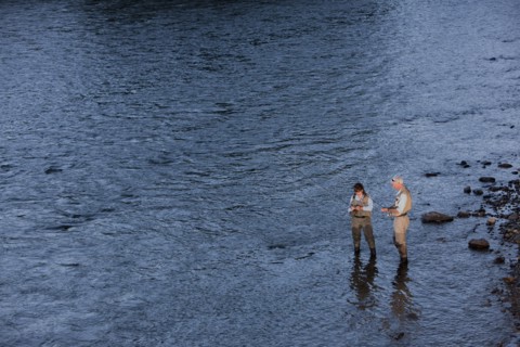 Canada, British Columbia, Fernie, Couple fly fishing in river. Photo : Dan Bannister