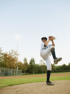 USA, California, Ladera Ranch, boy (10-11) playing baseball.