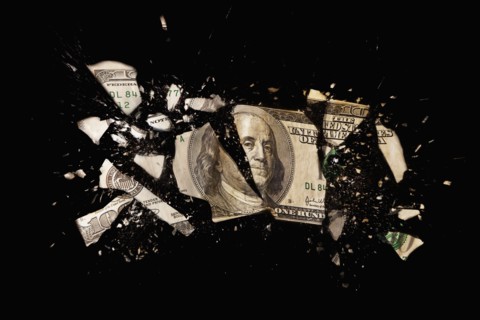 Cracked one hundred dollar bill. Photo : Mike Kemp